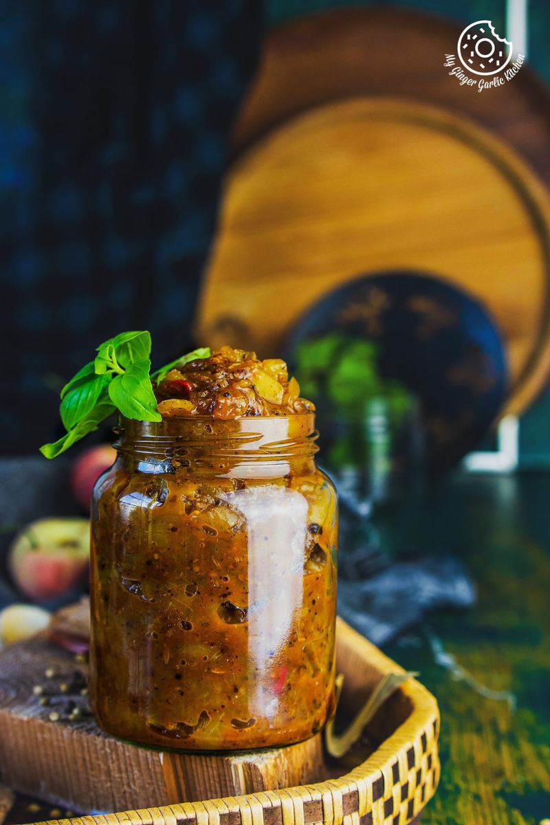 peach chutney jar decorated with basil leaves