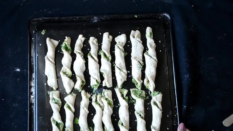 Image of the recipe cooking step-1-11 for Pizza Dough Twists with Parsley