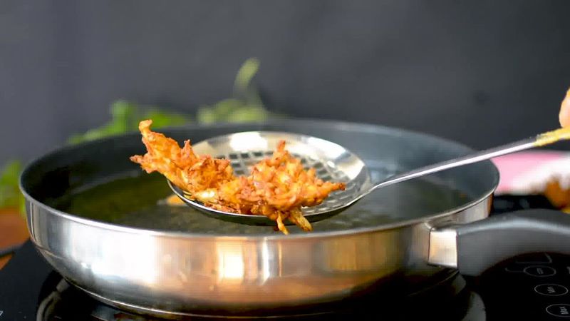 Image of the recipe cooking step-2-5 for Onion Pakoda (Fritters)