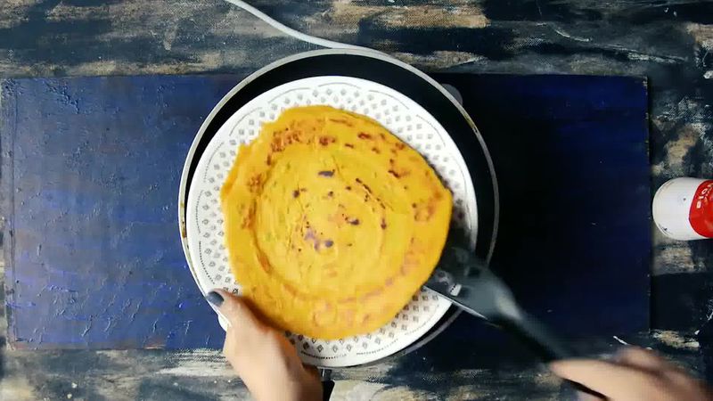 Image of the recipe cooking step-2-7 for Besan Ke Cheele Ka Raita - Chickpea Pancake Yogurt