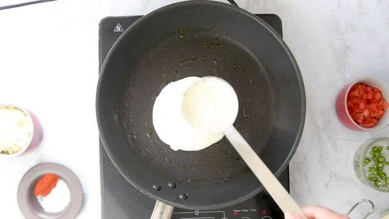Image of the recipe cooking step-2-2 for Rava Uttapam