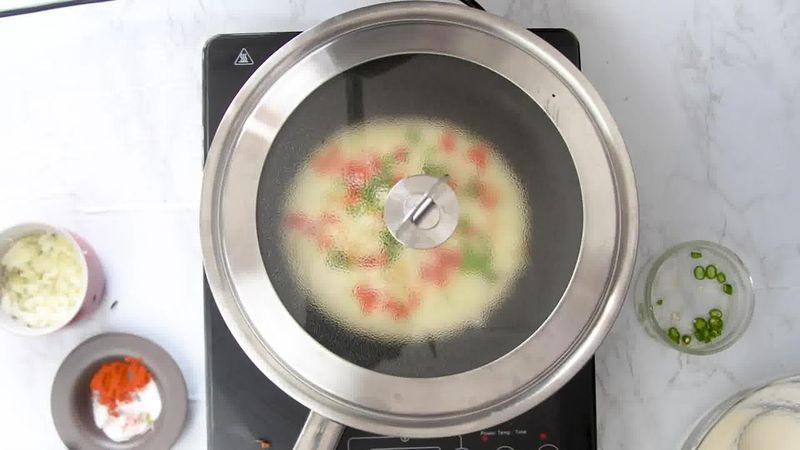 Image of the recipe cooking step-2-7 for Rava Uttapam