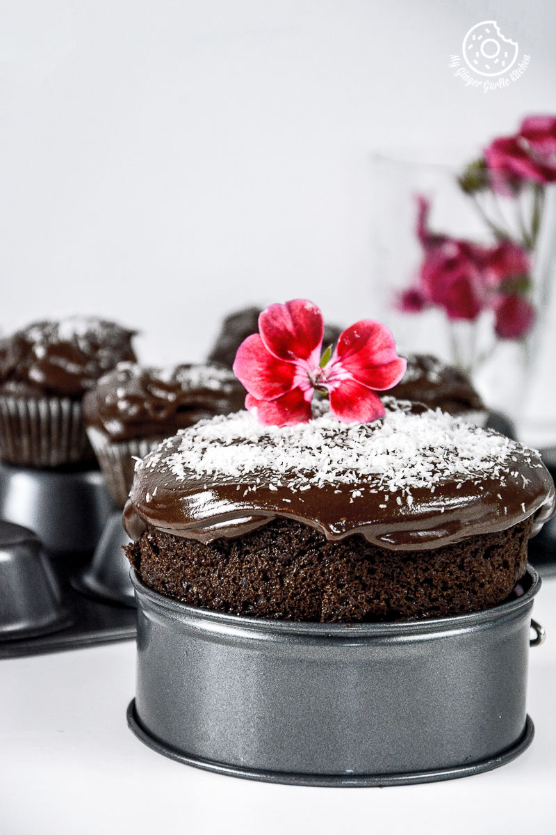 there is a chocolate beet cake with a flower on top of it