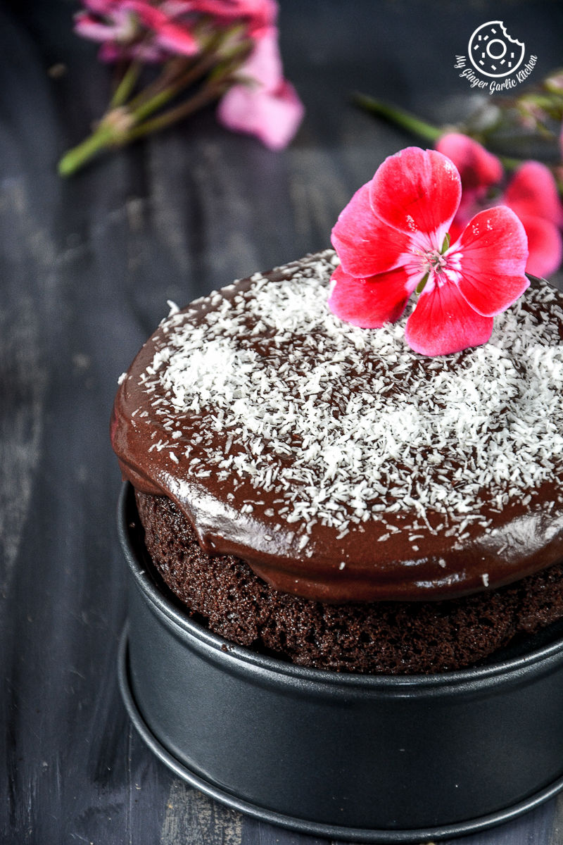 there is a chocolate beet cake with a flower on top of it