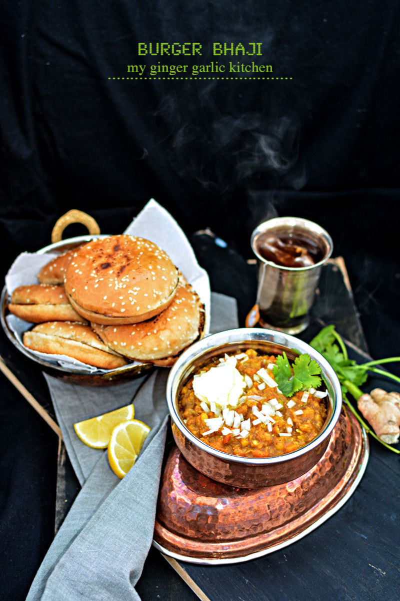 a plate of bhaji with a burger and a bowl of soup