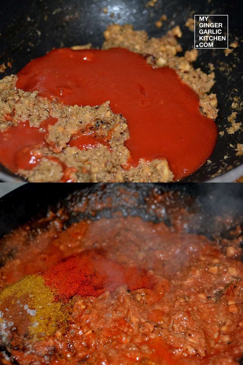tomato sauce being stirred in a wok with a spoon
