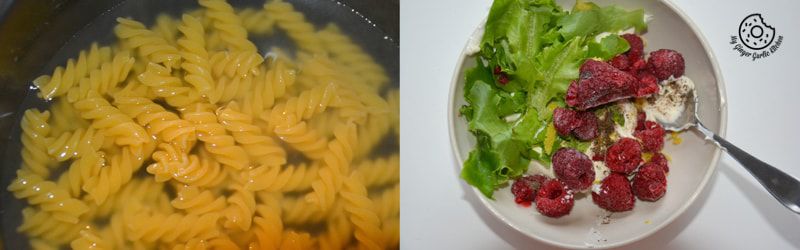 a close up of a bowl of pasta and a bowl of salad