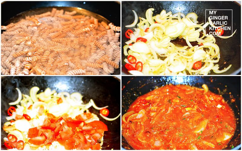 pasta and vegetables cooking in a pan with a sauce