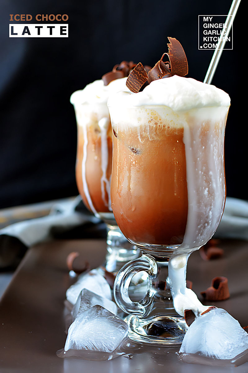two glasses of iced choco latte with ice cream and chocolate