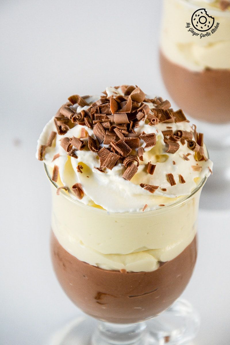 a mascarpone cream cheese chocolate mousse in a glass with chocolate shavings