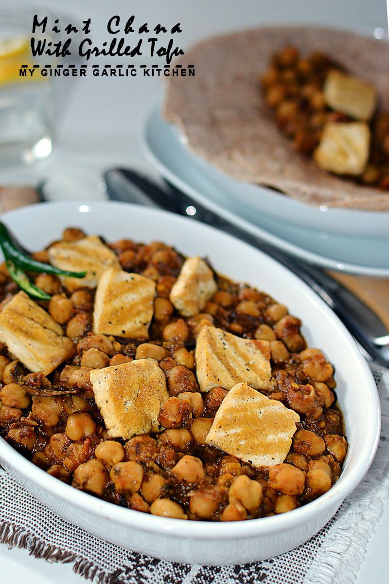 a bowl of a bowl of mint chana with grilled tofu and a plate tortilla with chickpeas