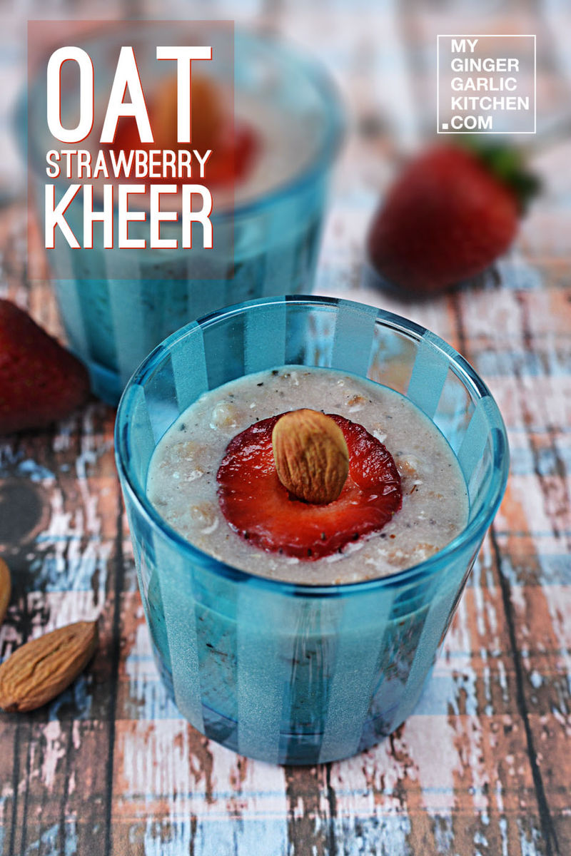 a bowl of oat strawberry kheer with strawberries and almonds