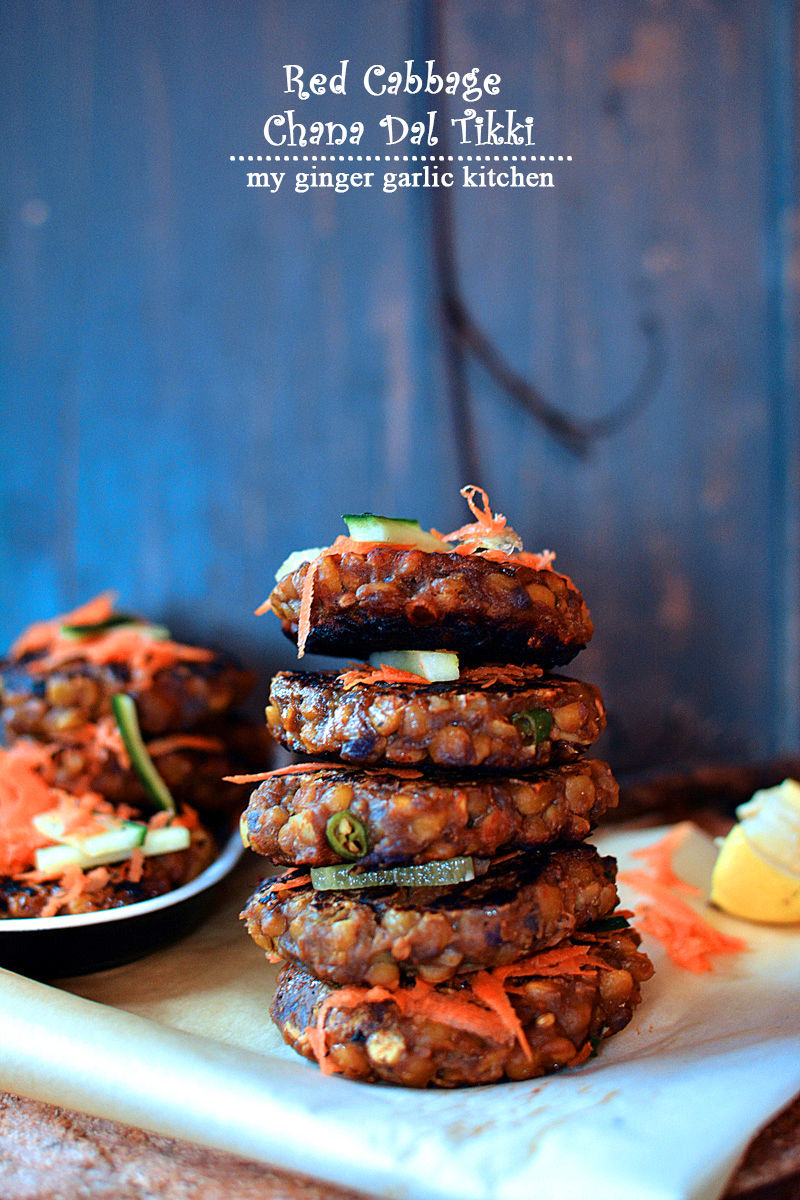 a stack of red cabbage chana dal tikkis on a plate on a table