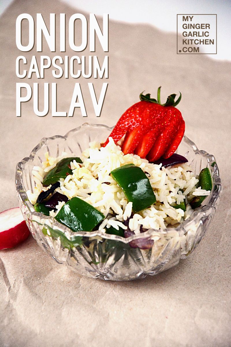 a bowl of onion capsicum pulao with a strawberry on top
