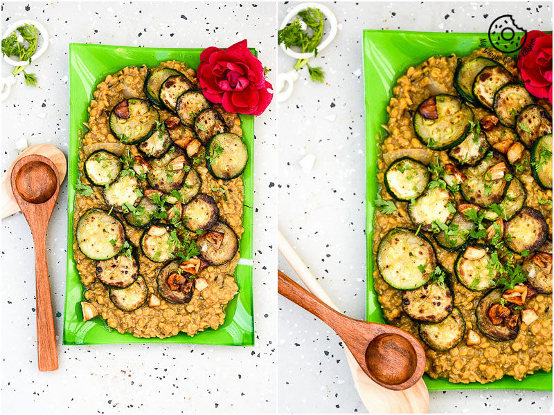 two plates of roasted zucchini garlic with spiced chana dal on a table with a wooden spoon