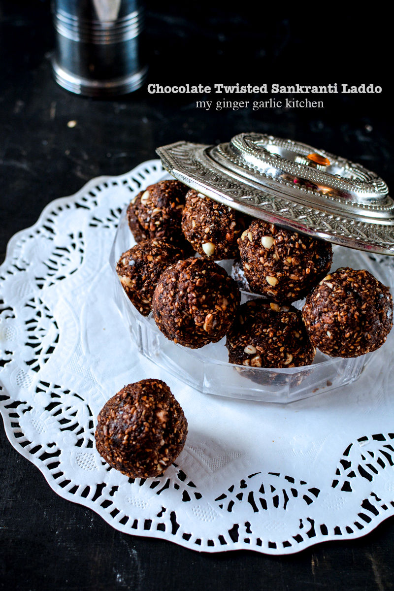 no bake chocolate twisted sankranti laddo on a table in a glass bowl on a doily