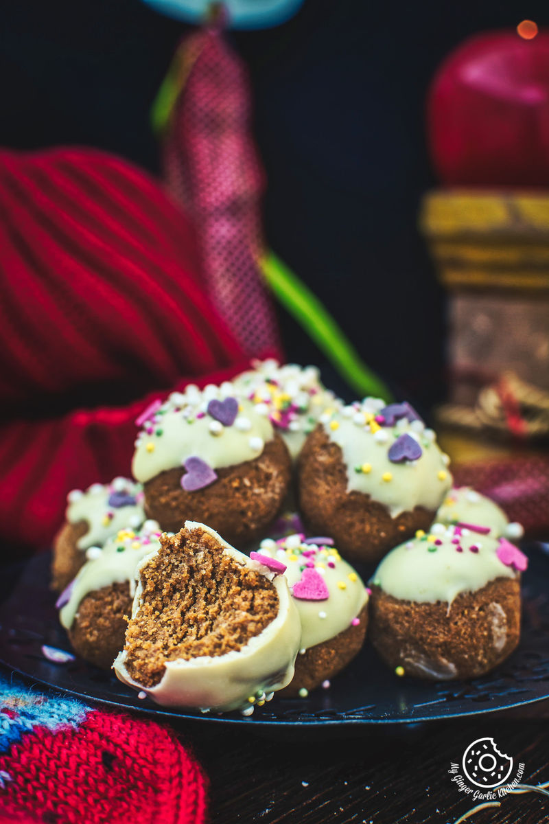 gingerbread truffles photographed on a dark background