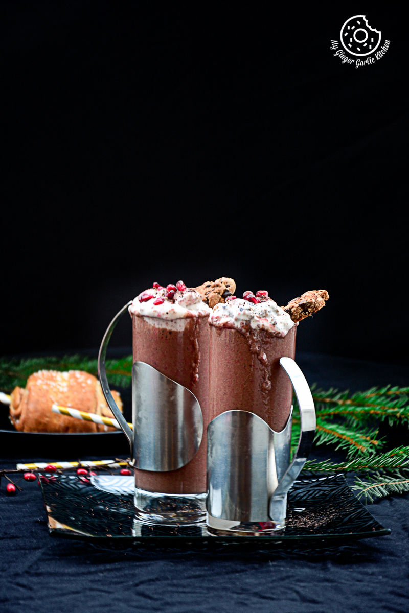 a banana berry choco coffee smoothie with whipped cream