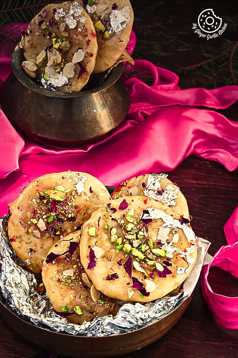 there are some Jaipuri Mawa Kachoris on a plate on a table