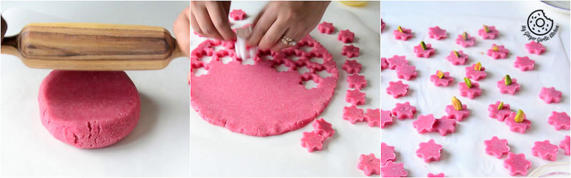someone is making a pink heart shaped cake with pink icing