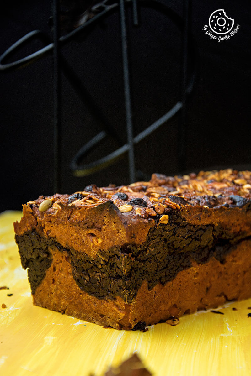 a loaf of pumpkin muesli chocolate bread that is sitting on a table