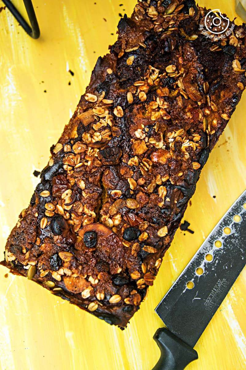 pumpkin muesli chocolate bread with nuts and raisins on it