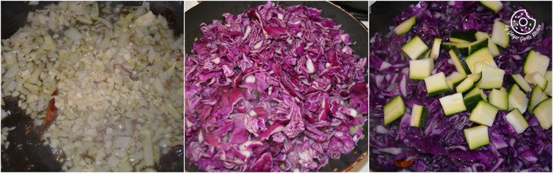 a close up of a pan of food with onions and zucchini