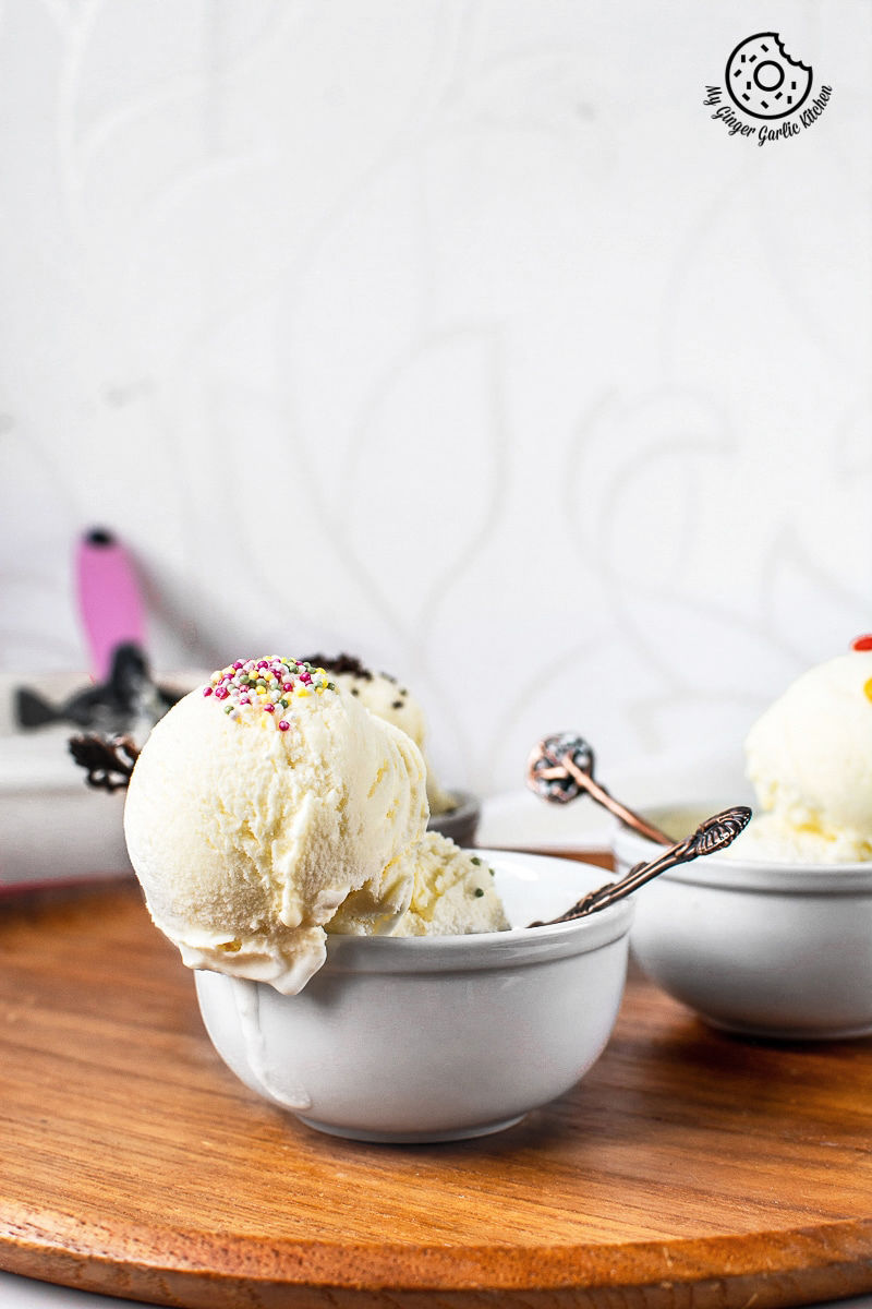 two bowls of homemade vanilla ice cream with sprinkles on them