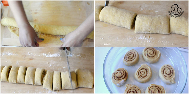 pumpkin cinnamon roll dough being cut and rolled up on a cutting board