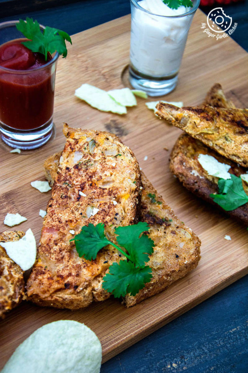 some sooji toast rava toasts and some sauces on a cutting board