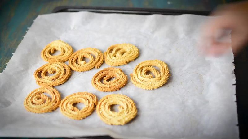Image of the recipe cooking step-4-3 for Chakli Recipe – Instant Rice Chakli (Fried + Baked)