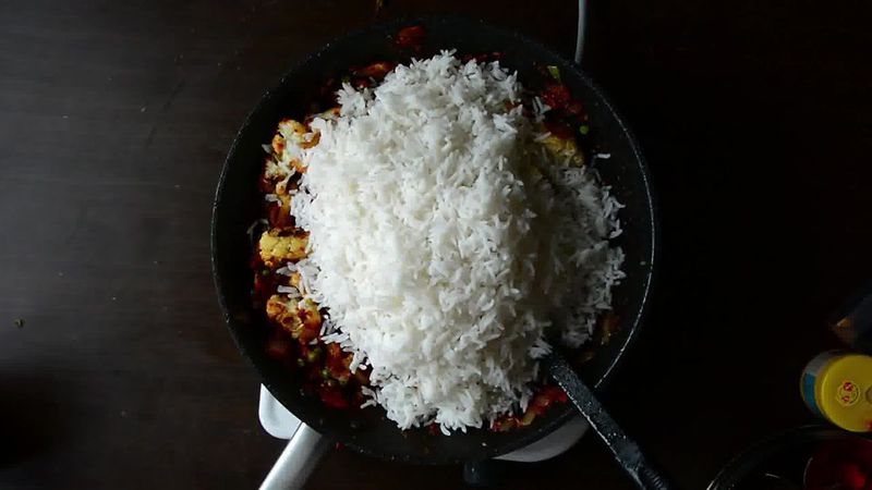 Image of the recipe cooking step-3-11 for Roasted Cauliflower Pilaf With Watermelon Sauce