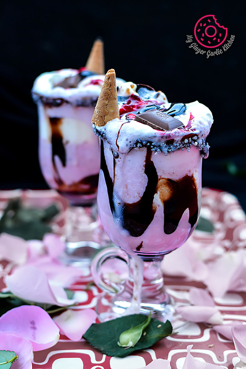 two valentine smoothies in a glass with ice cream and chocolate