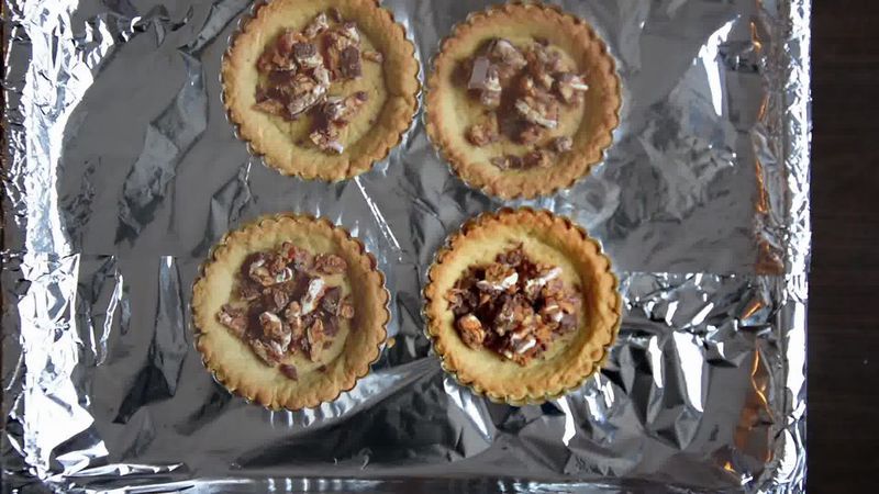 Image of the recipe cooking step-1-12 for Snickers Mini Chocolate Tarts