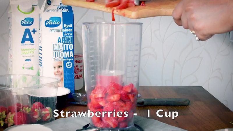Image of the recipe cooking step-1-1 for Strawberry Lassi Recipe - Strawberry Yogurt Smoothie  