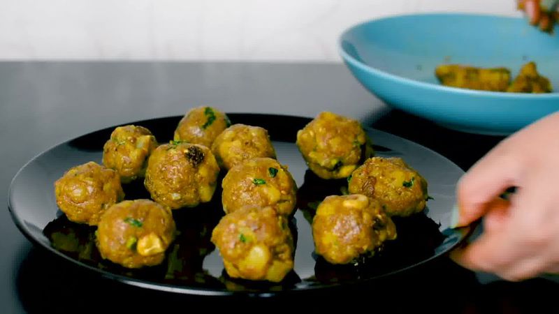Image of the recipe cooking step-2-11 for Masala Bati - Stuffed Masala Bati - Bharwa Masala Baati