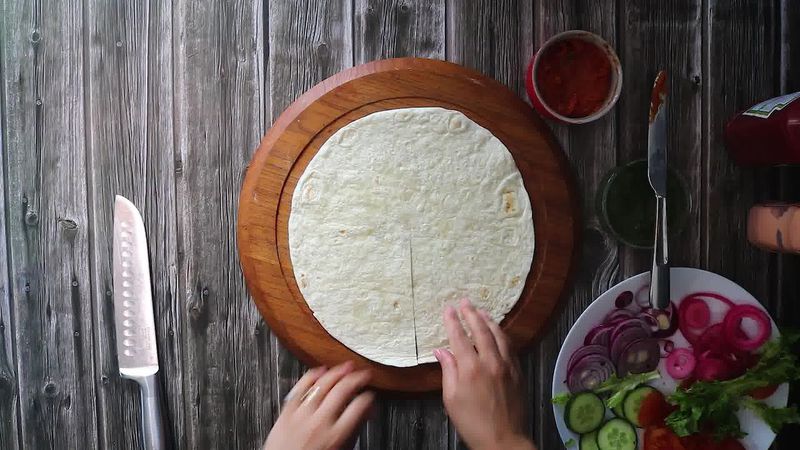 Image of the recipe cooking step-3-1 for TikTok Tortilla Wrap Hack (6 Vegetarian Filling Ideas)