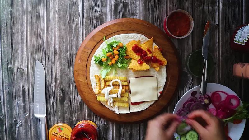 Image of the recipe cooking step-3-5 for TikTok Tortilla Wrap Hack (6 Vegetarian Filling Ideas)
