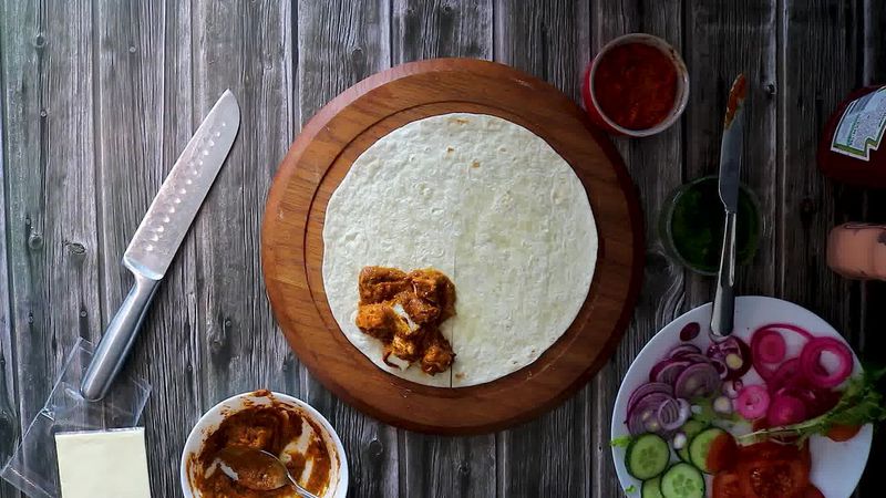 Image of the recipe cooking step-4-2 for TikTok Tortilla Wrap Hack (6 Vegetarian Filling Ideas)