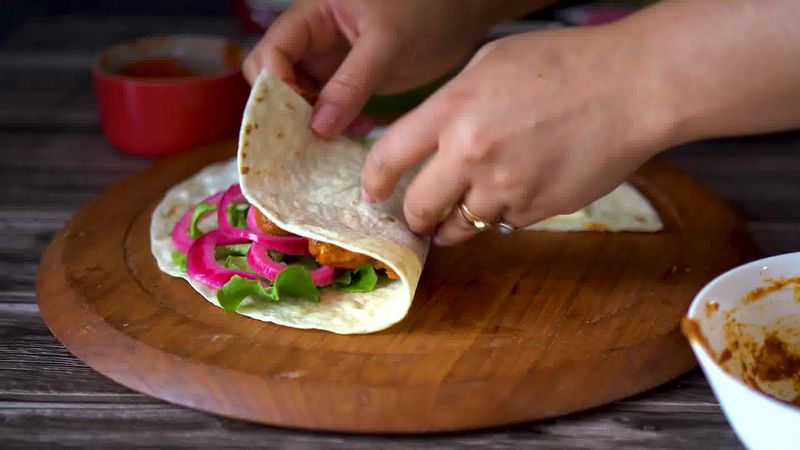 Image of the recipe cooking step-4-6 for TikTok Tortilla Wrap Hack (6 Vegetarian Filling Ideas)