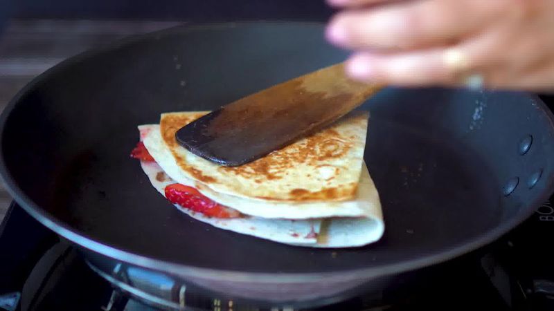 Image of the recipe cooking step-5-7 for TikTok Tortilla Wrap Hack (6 Vegetarian Filling Ideas)