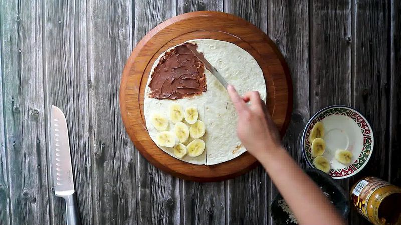 Image of the recipe cooking step-6-3 for TikTok Tortilla Wrap Hack (6 Vegetarian Filling Ideas)