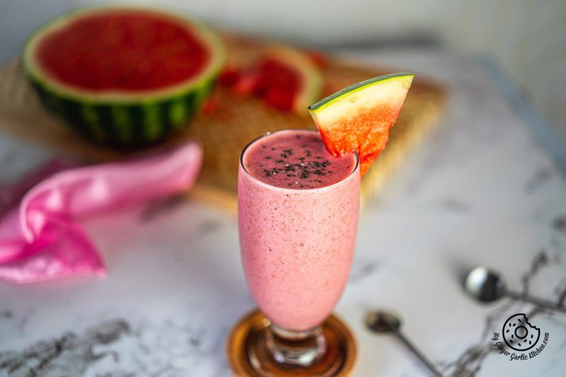 Watermelon Smoothie in a glass with chia and watermelon slice